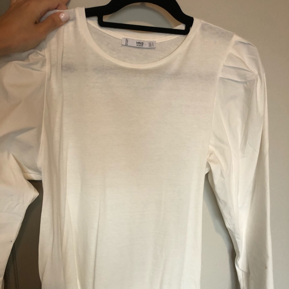Stylish top with exaggerated shoulders